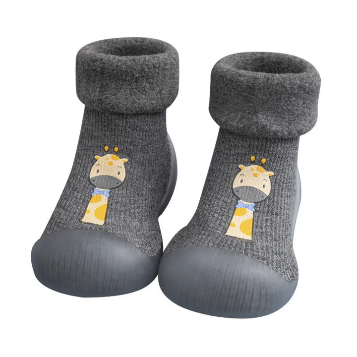 Gray toddler socks with non-slip soles featuring cute giraffe cartoon design