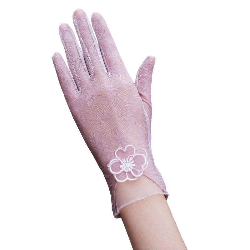 Elegant pink lace glove with floral embroidery on wrist, feminine and delicate fashion accessory