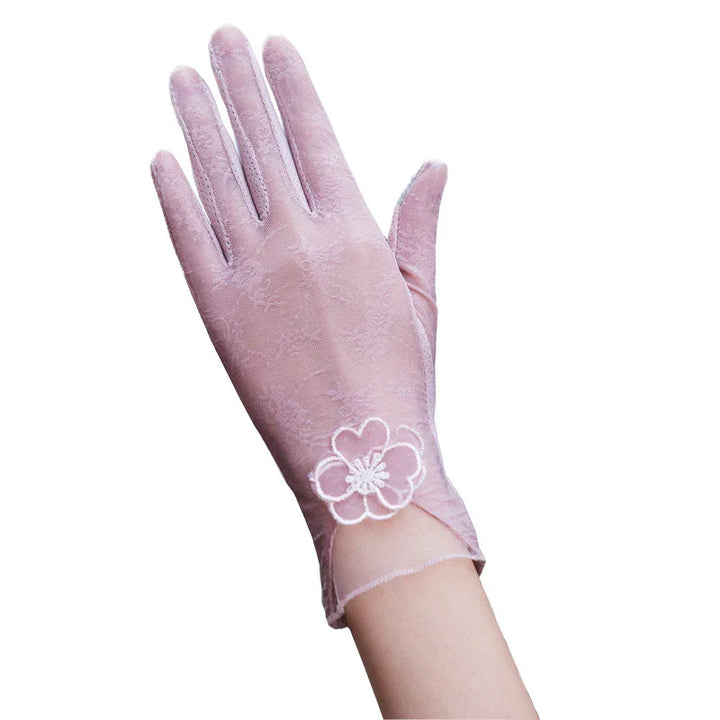 Elegant pink lace glove with floral embroidery on wrist, feminine and delicate fashion accessory