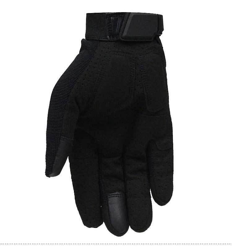 Black tactical glove with adjustable wrist strap and reinforced finger tips on white background