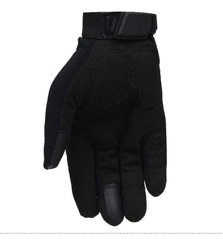 Black tactical glove with adjustable wrist strap and reinforced finger tips on white background