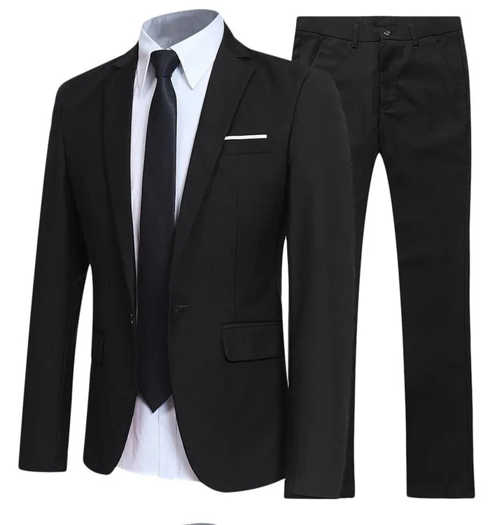Black men's suit set with blazer, white dress shirt, black tie, and matching pants