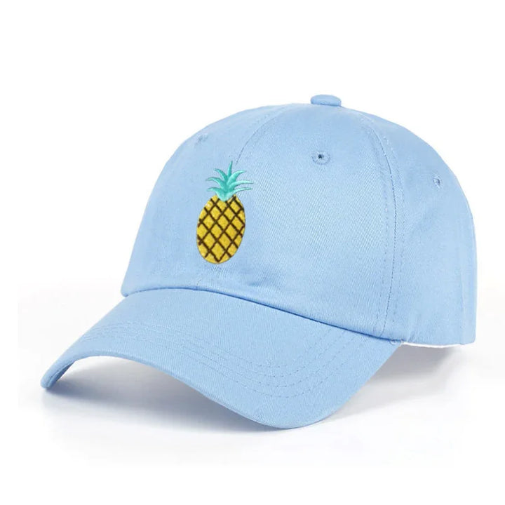 Light blue baseball cap with embroidered yellow pineapple design on front