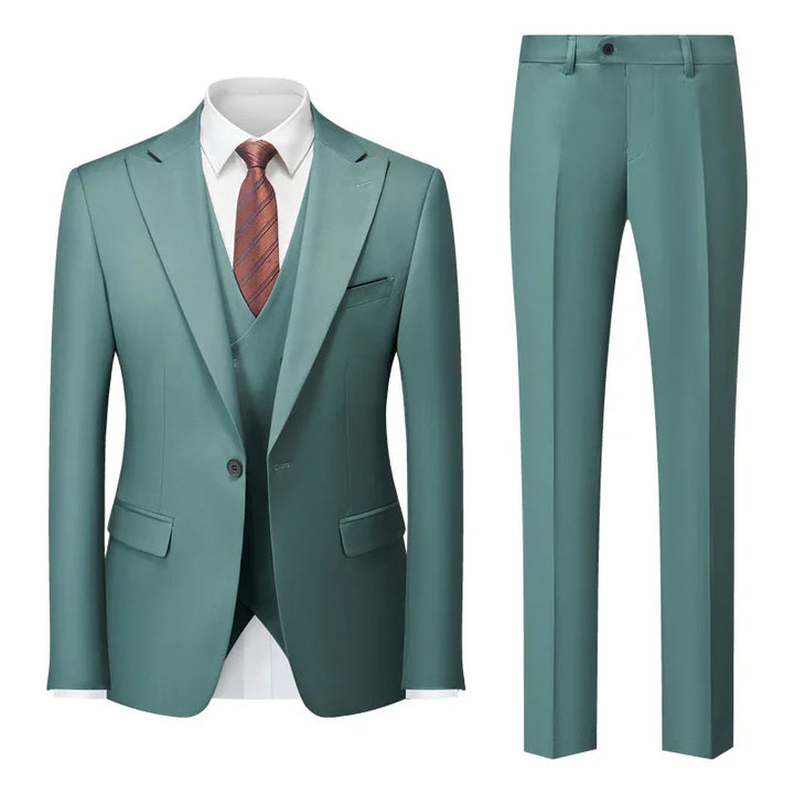 Men's teal three-piece suit with jacket, matching vest, trousers, white shirt, and brown striped tie