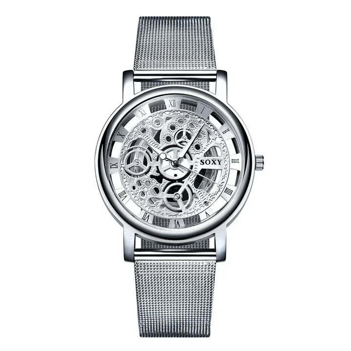 Silver SOXY skeleton watch with Roman numerals and mesh strap showing intricate gears