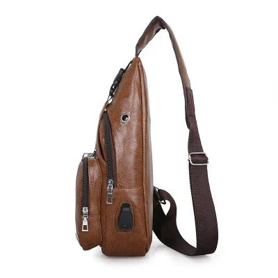 brown leather sling backpack with front zipper pocket and adjustable dark brown strap