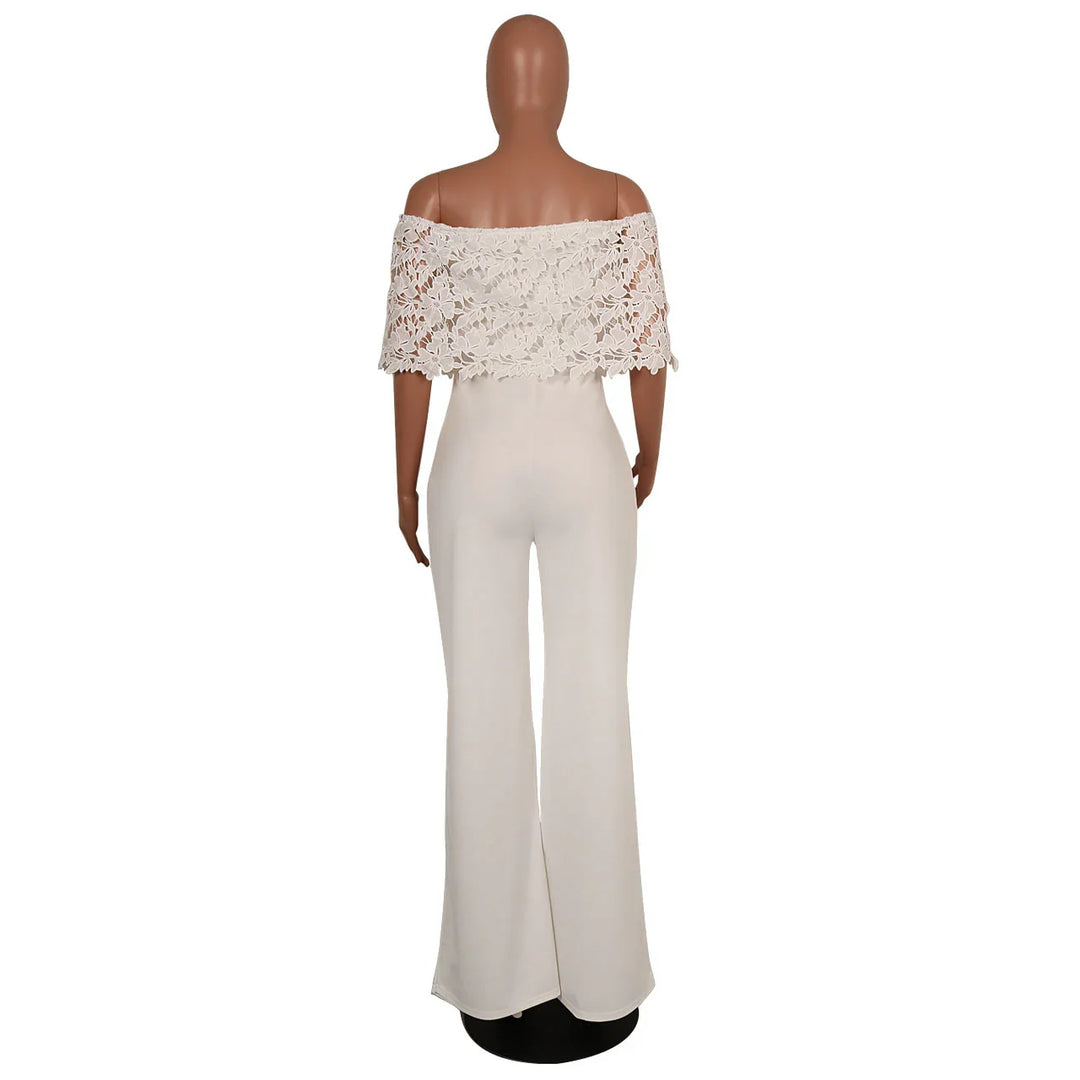 Back view of mannequin wearing white off-shoulder lace crop top and high-waisted wide-leg pants