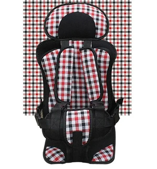 Red, black, and white plaid baby carrier with padded straps and head support