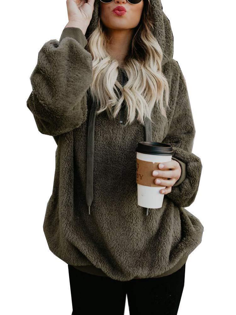 Woman wearing olive green plush hoodie holding takeaway coffee cup with sunglasses and wavy blonde hair