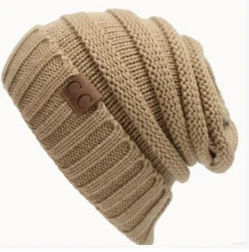Beige chunky knit slouchy beanie hat with ribbed pattern and CC logo patch
