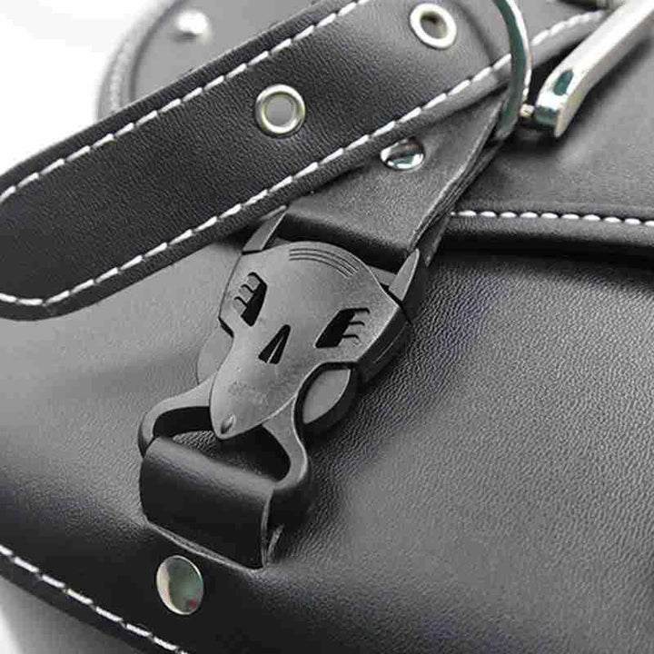 Black faux leather bag with white stitching and a wolf-shaped clasp buckle detail