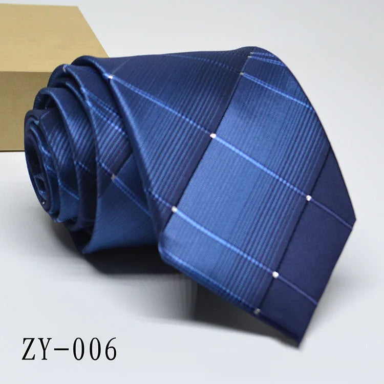 Rolled navy blue plaid men's necktie with light blue and white diagonal stripes on white background