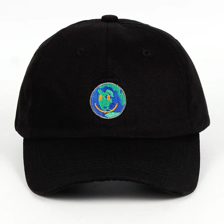 Black baseball cap with embroidered smiling Earth logo in blue, green, and orange