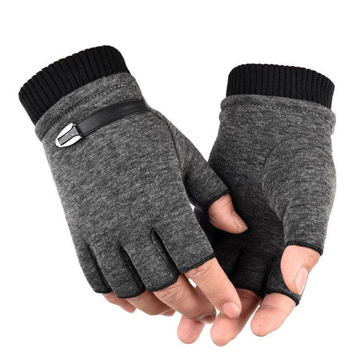 Hands wearing gray fingerless gloves with black ribbed cuffs and a decorative metal buckle