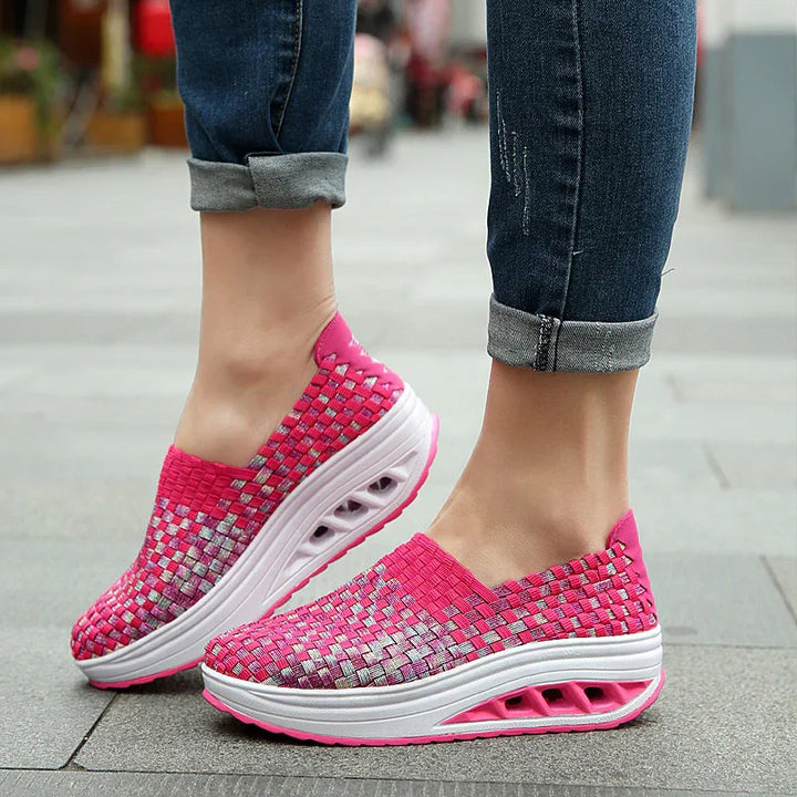 women's pink woven slip-on platform sneakers with thick white sole on street