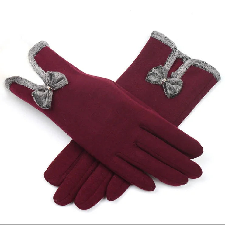 Women's burgundy winter gloves with gray faux fur trim and decorative bows