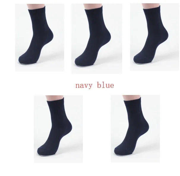 navy blue ankle socks worn on feet against white background, multiple angles
