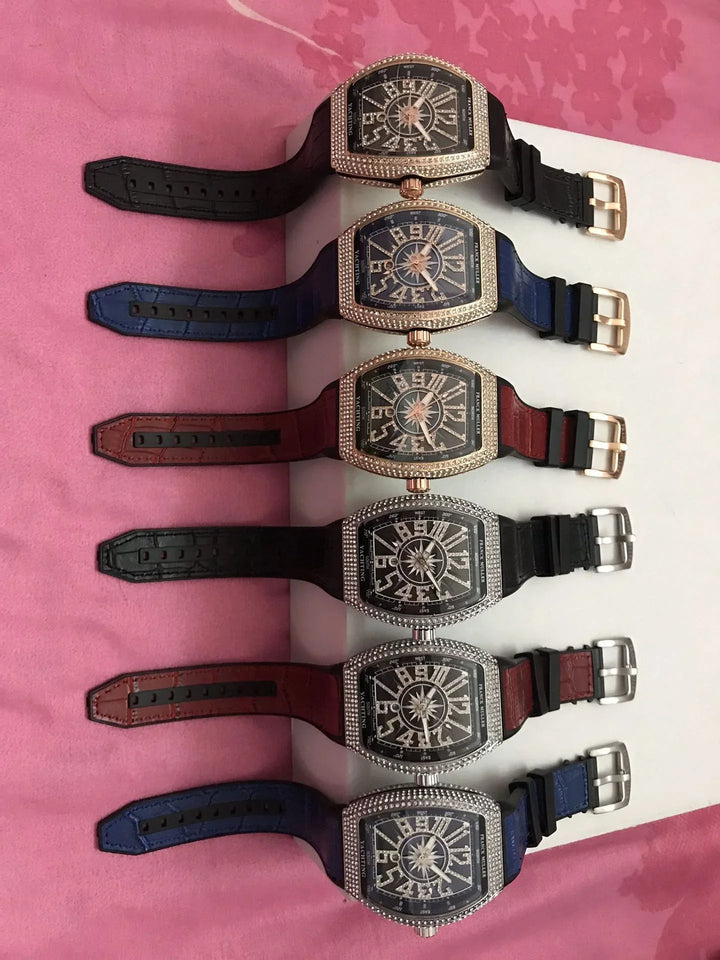 Six luxury Franck Muller Yachting watches with diamond bezels and leather straps in black, blue, and brown on pink background