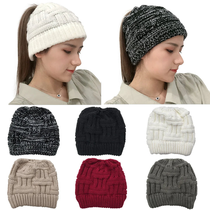 Knit ponytail beanies in black, white, beige, red, gray, and black-white marled colors with stacked knit pattern