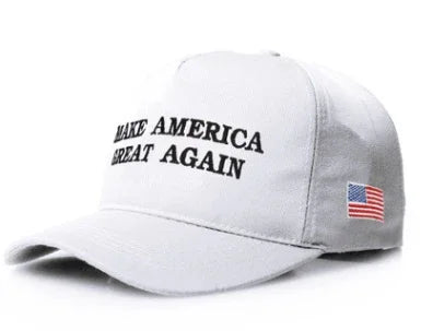 White baseball cap with embroidered text 'MAKE AMERICA GREAT AGAIN' and a small American flag patch on the side