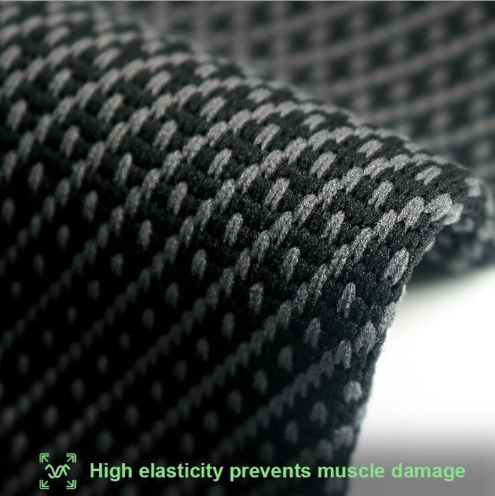 Close-up of high elasticity black and gray textured fabric for muscle support.