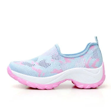 Light blue and pink women's slip-on mesh sneaker with thick white and pink sole