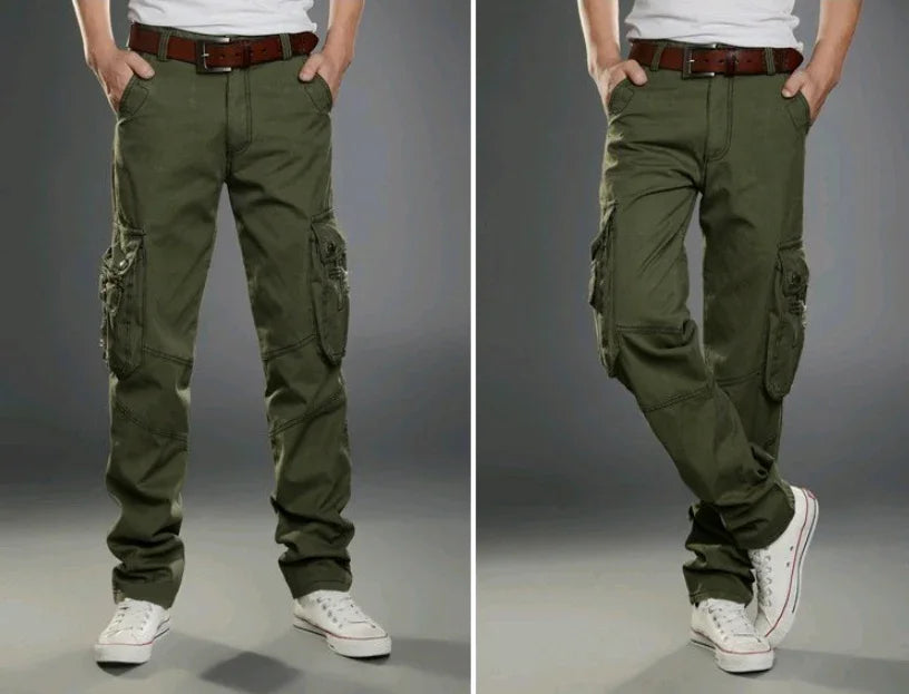 Men's olive green cargo pants with multiple pockets, worn with white sneakers and brown belt