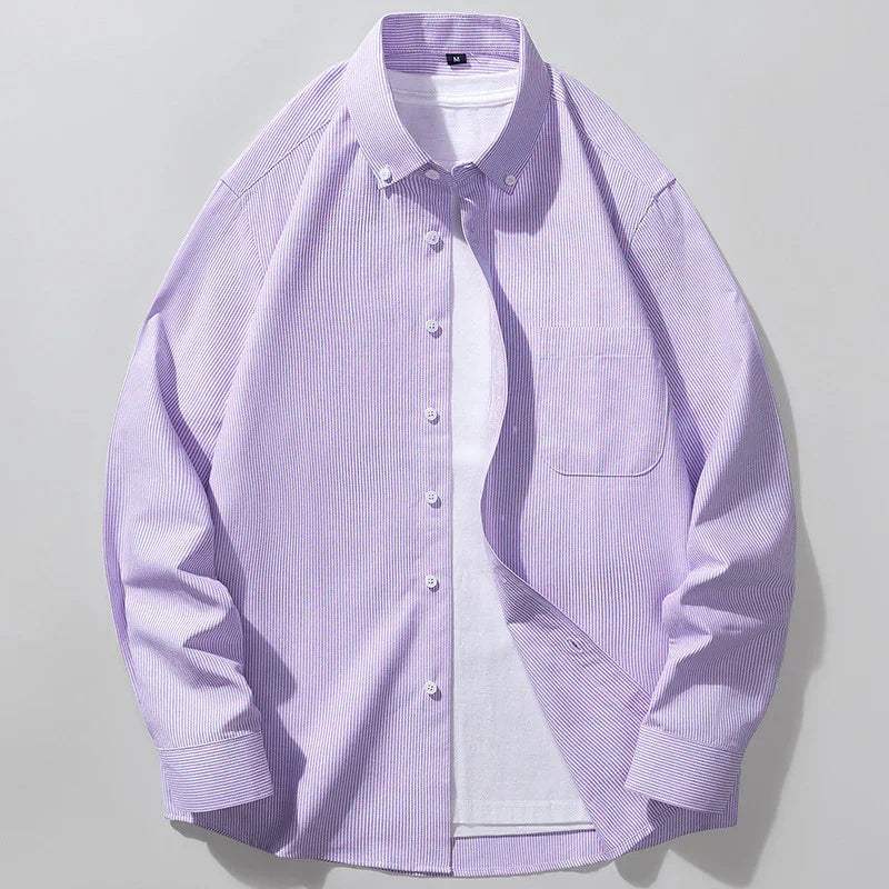 Men's purple striped button-up dress shirt with button-down collar over white t-shirt
