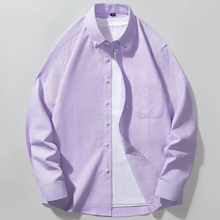 Men's purple striped button-up dress shirt with button-down collar over white t-shirt