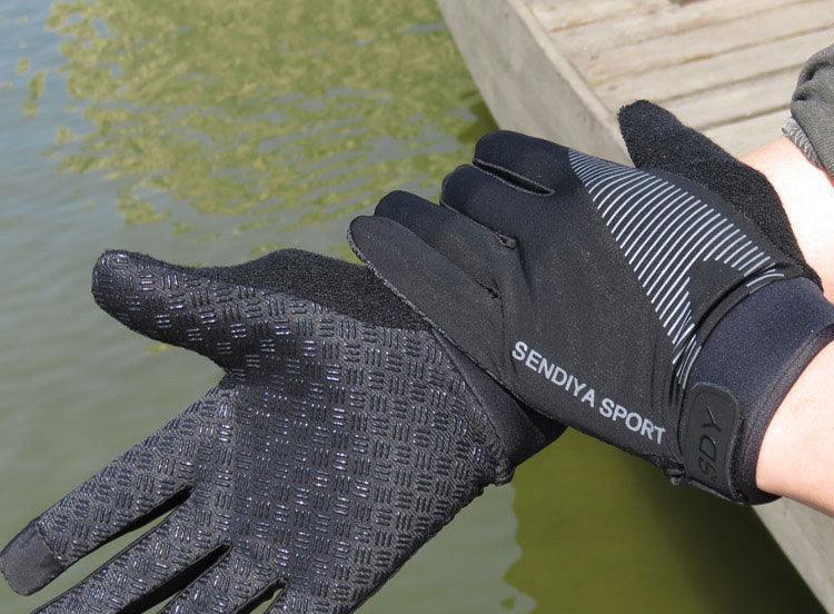 Person wearing black SENDIYA SPORT gloves with textured grip near a wooden dock over water