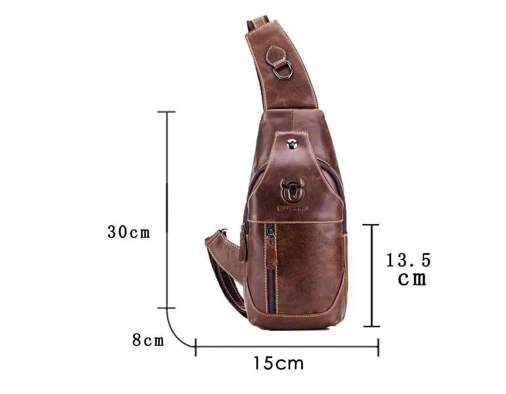 Brown leather sling bag with front zipper pocket and embossed bull logo, measuring 30x15x8 cm