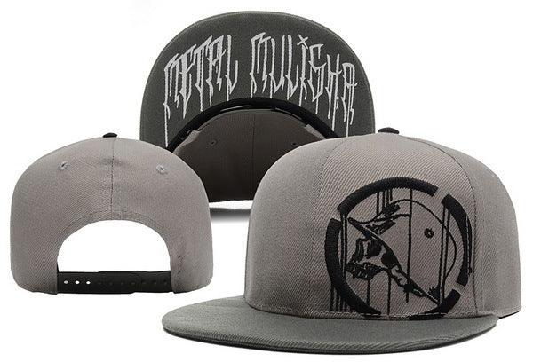 Gray snapback hats featuring black abstract bird design on front and text Metal Mulisha inside brim