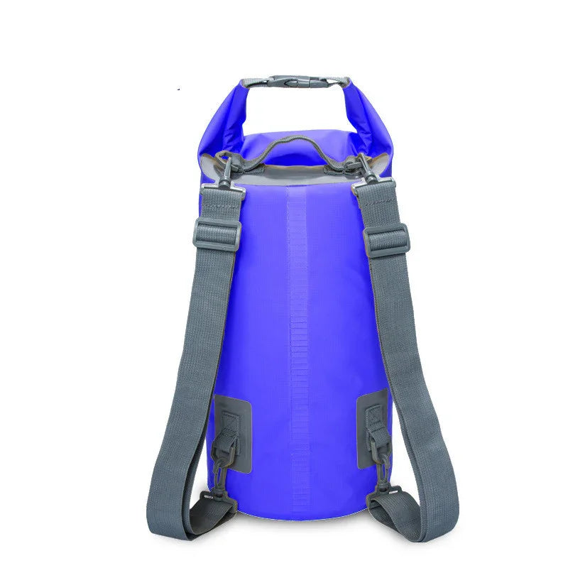 Blue waterproof dry bag backpack with adjustable gray straps on white background