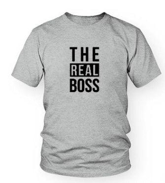 Gray T-shirt with black bold text 'THE REAL BOSS' printed on the front