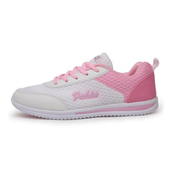 Pink and white casual sneaker with breathable mesh fabric and padded heel collar