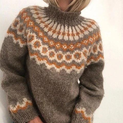 Cozy brown wool sweater with orange and white Nordic pattern on yoke and cuffs