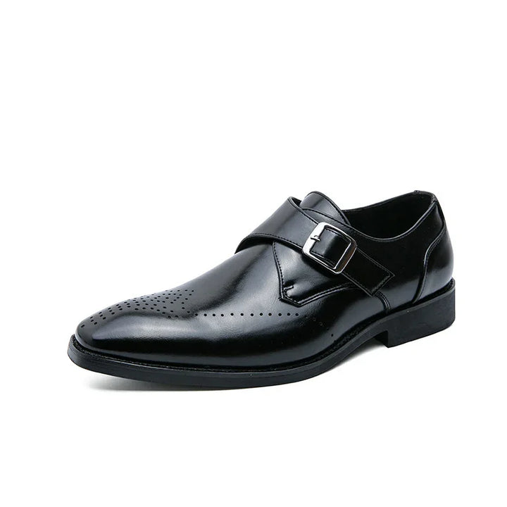 Black leather men's dress shoe with silver buckle and perforated detailing