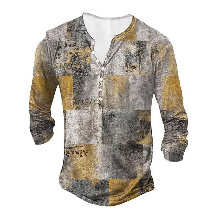 Men's long sleeve henley shirt with abstract gray, black, and mustard yellow patch pattern