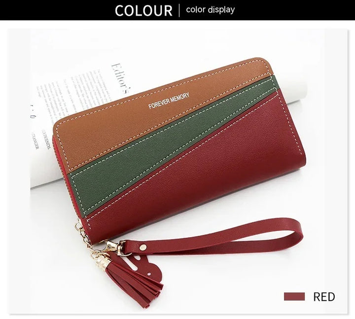 Red, brown, and green leather wristlet wallet with tassel and FOREVER MEMORY text