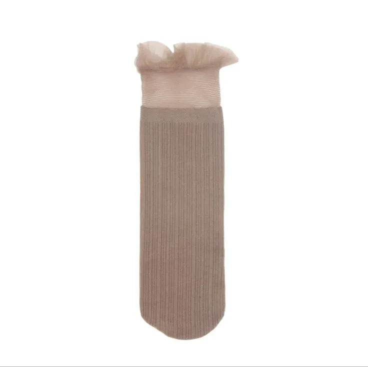 Beige ribbed sock with sheer ruffled top detail on white background