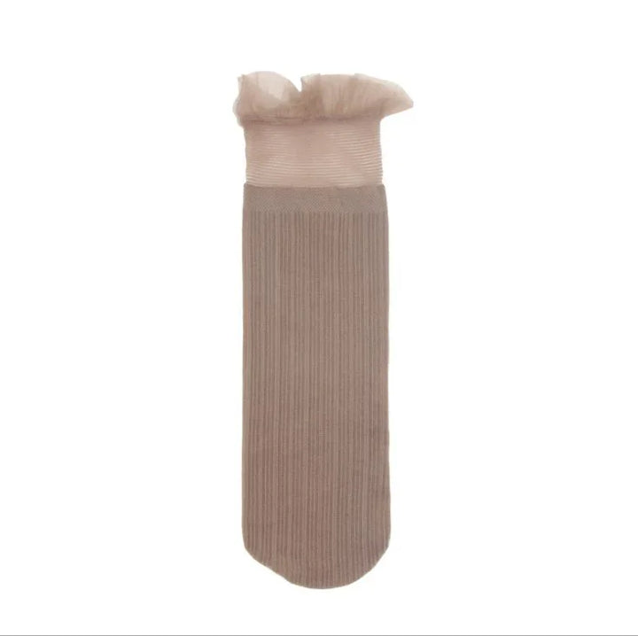 Beige ribbed sock with sheer ruffled top detail on white background