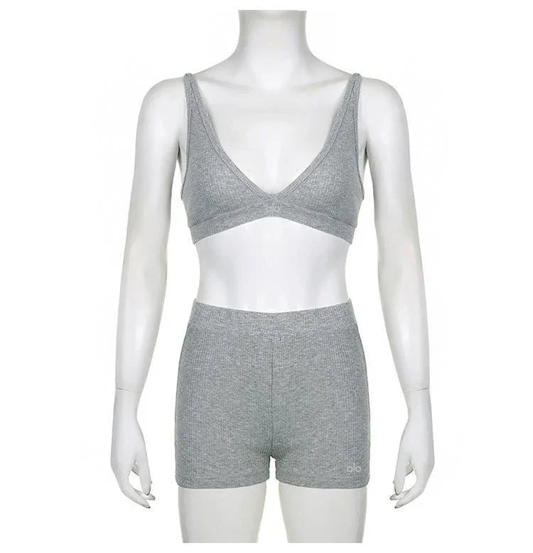 gray ribbed knit sports bra and high-waisted shorts activewear set on mannequin