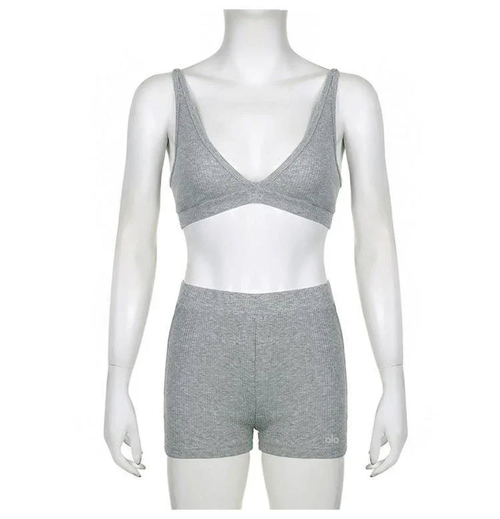 gray ribbed knit sports bra and high-waisted shorts activewear set on mannequin