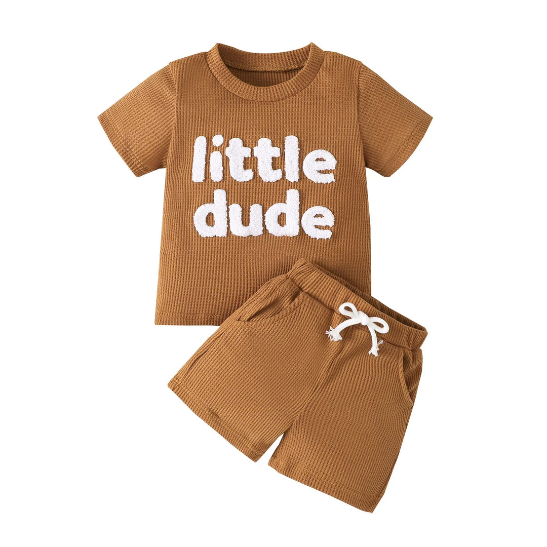 Brown waffle knit toddler outfit with white 'little dude' text t-shirt and matching shorts