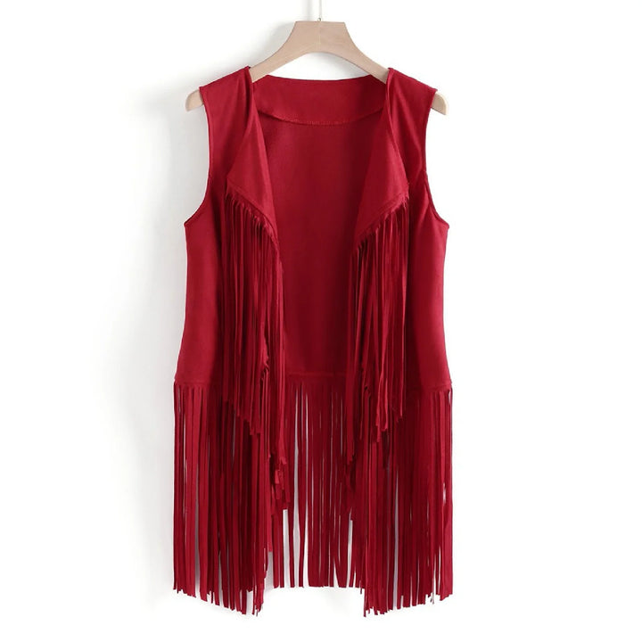 Red sleeveless fringe vest hanging on wooden hanger on white background