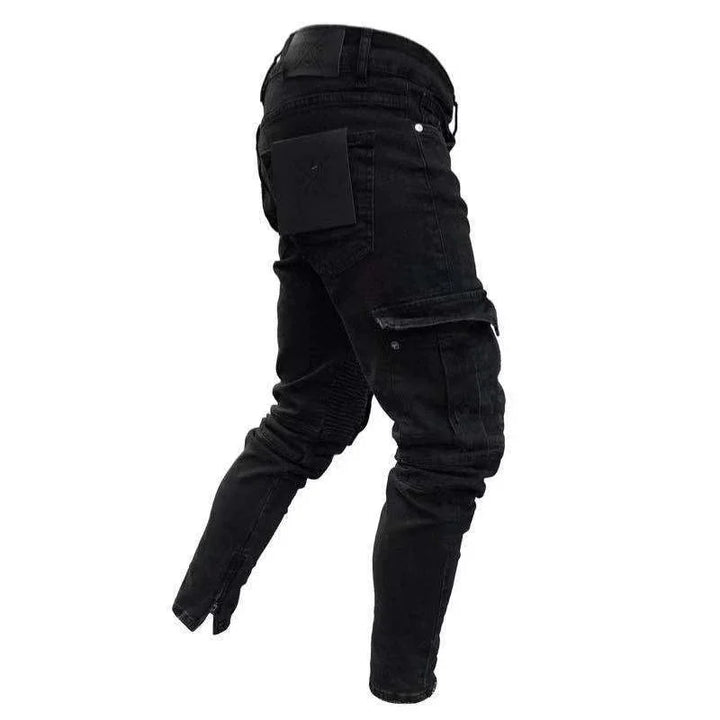 black slim fit cargo jeans with zipper ankles and back pocket detailing