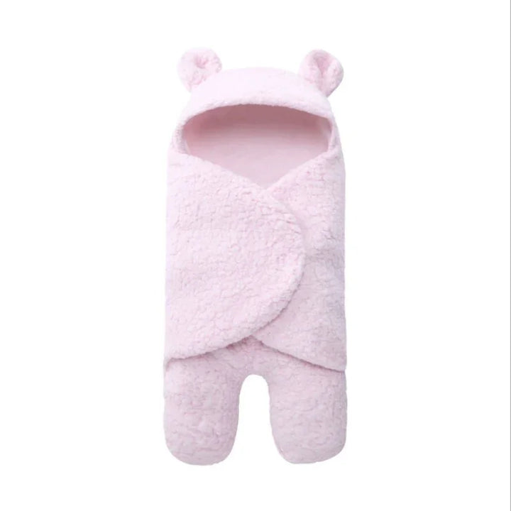 Soft pink baby swaddle blanket with hood and bear ears, cozy fleece material