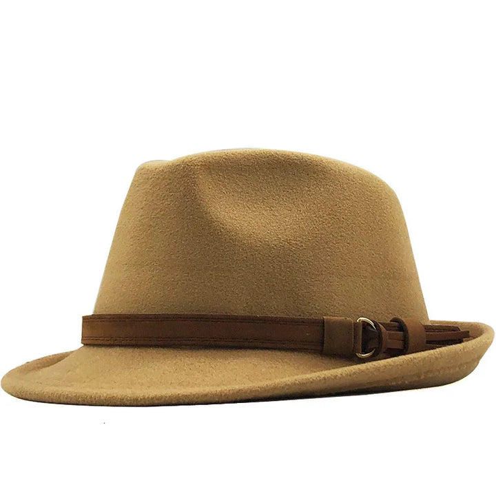 Camel brown felt fedora hat with a leather strap and tassel detail on a white background