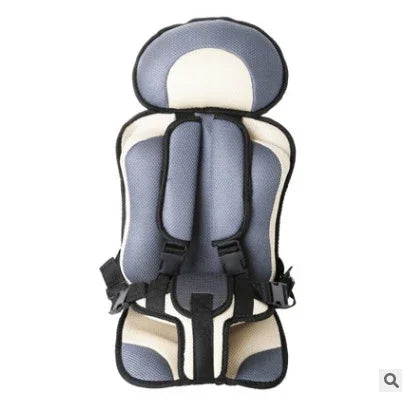 Gray and beige padded baby car seat insert with safety harness straps