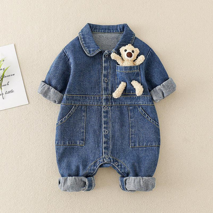 Blue denim baby romper with rolled sleeves and legs, front pockets, and teddy bear in chest pocket